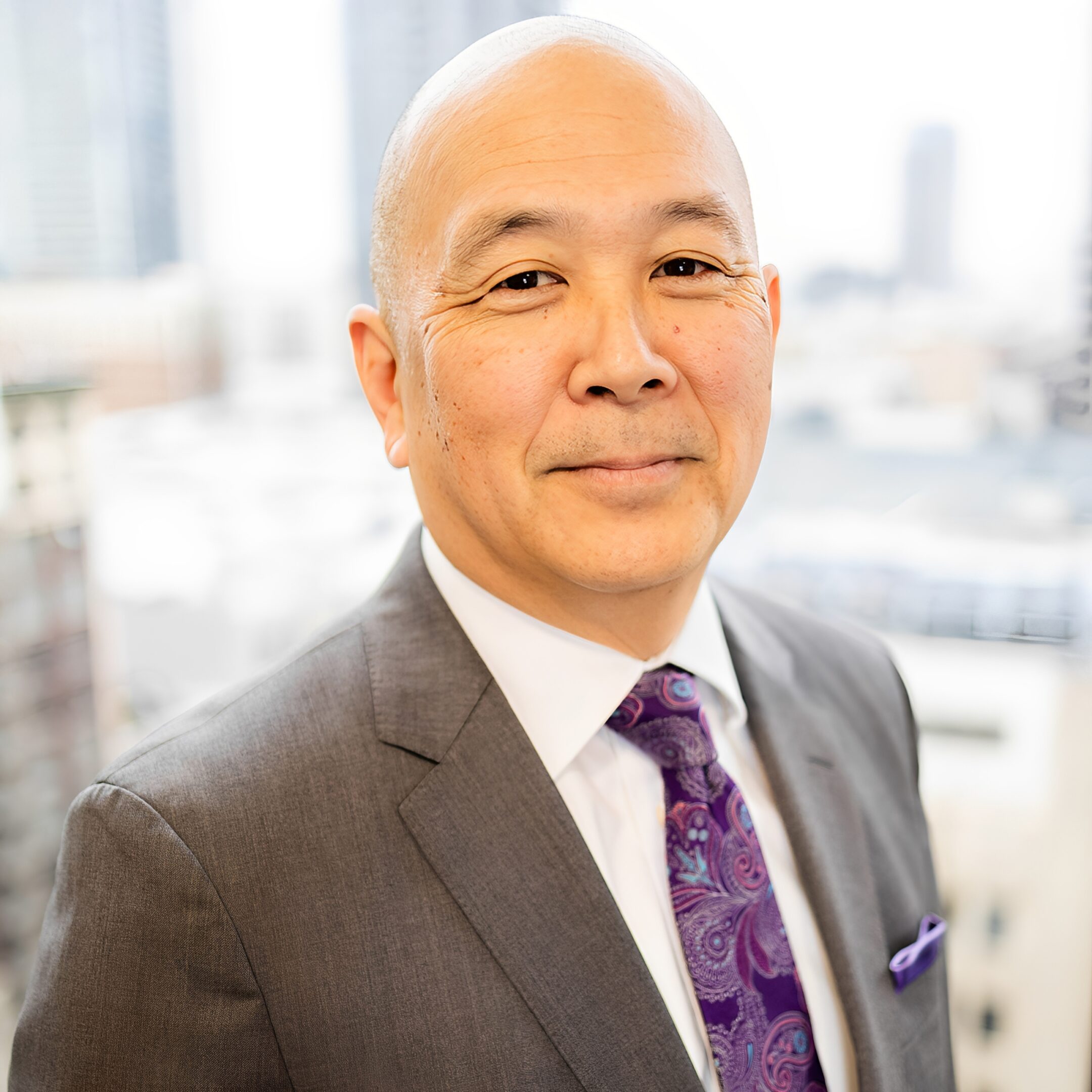 Professional portrait with city background